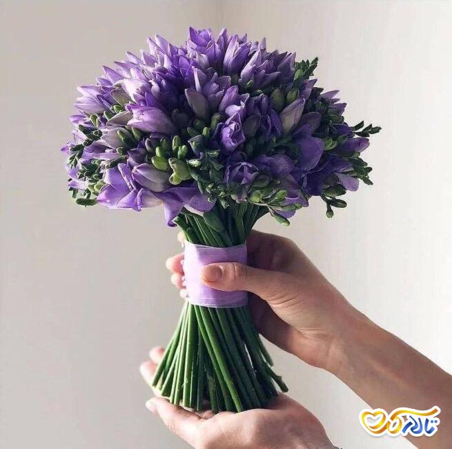 دسته گل عقد به رنگ بنفش